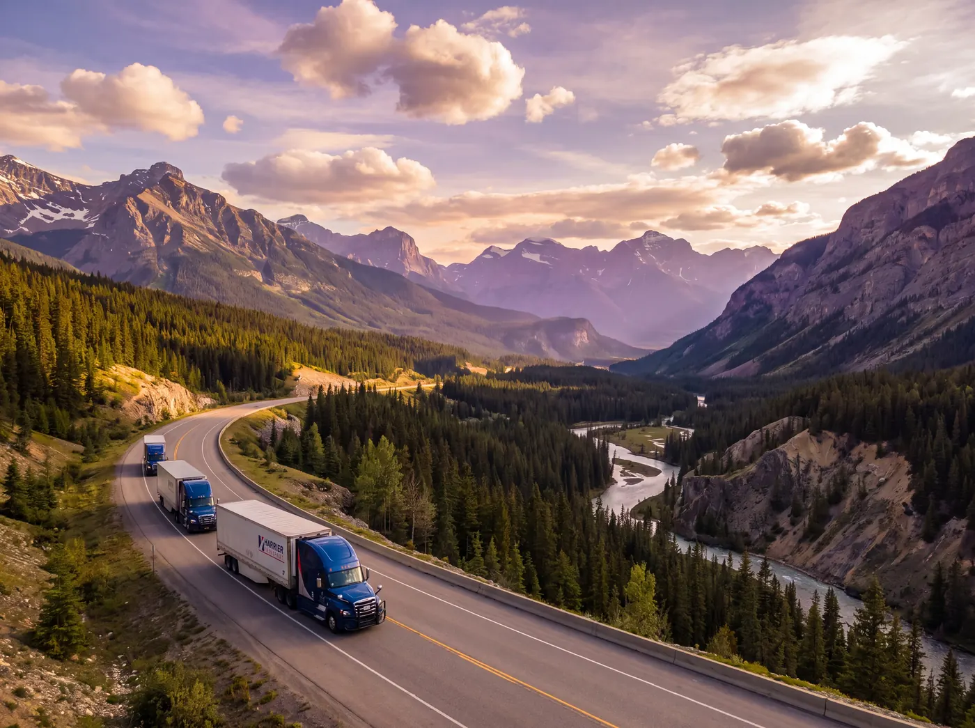 Harrier Transport truck on a highway through the Canadian Rockies